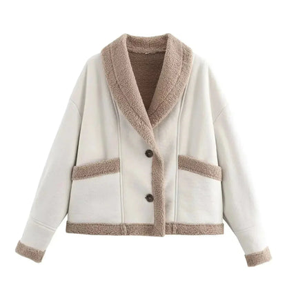 Veste d'hiver femme blanche en imitation suède avec doublure en polaire pour plus de chaleur et de confort.