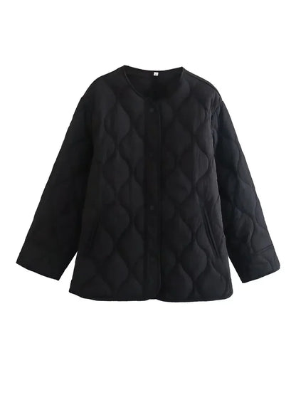 Veste femme ample matelassée noire pour l'hiver, avec fermeture éclair et coupe décontractée.