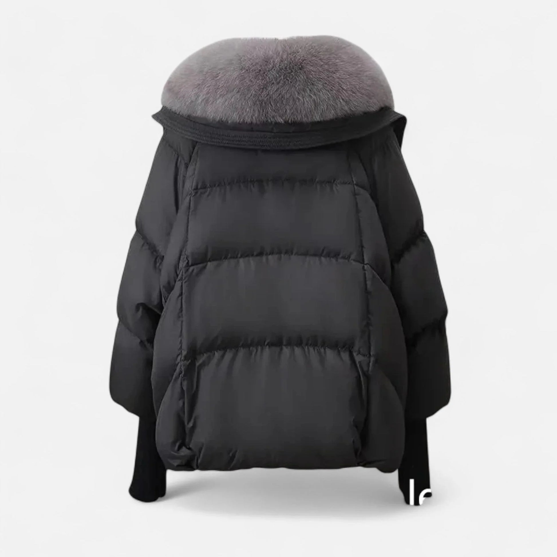 Veste femme noire avec col en fausse fourrure et manches côtelées, en tissu doux, adaptée pour les jours frais.