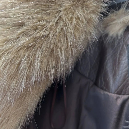 Veste femme marron vintage avec col doublé et poches, en matériau doux et résistant.