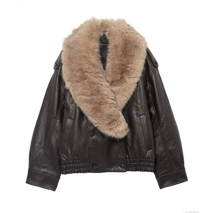 Veste femme marron vintage avec col doublé et poches, conçue en matériau résistant.